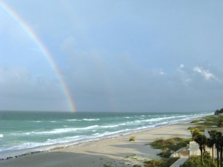 Summer rainbow over the Gulf, viewed from Longboat Key. Photo copyright Lisa W.