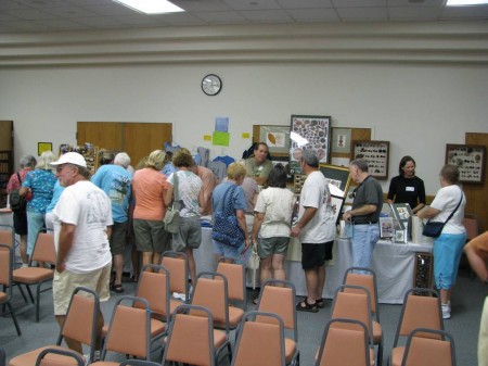 IMG_4918 All four walls inside the Symposium are lined with exhibit tables and hundreds of curious people come and enjoy the free display.