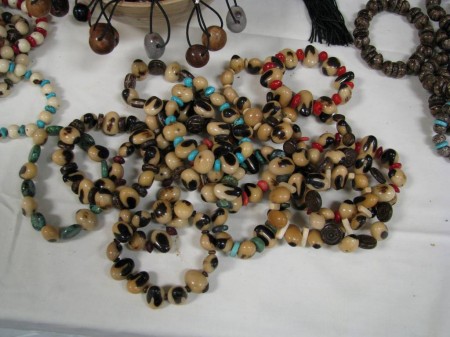 There will be a lot of sea-bean jewelry and works of art and craft at the Symposium. Here are a few of the bracelets and necklaces on display.