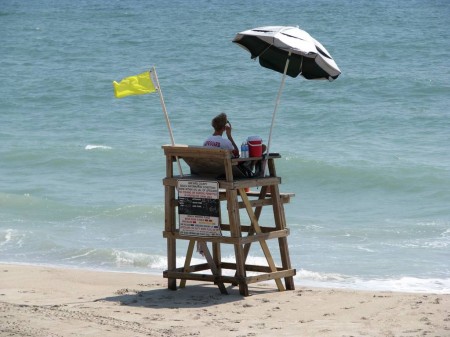 A lifeguard sets the pace for life in Indialantic Beach on a mid-summer day in July.
