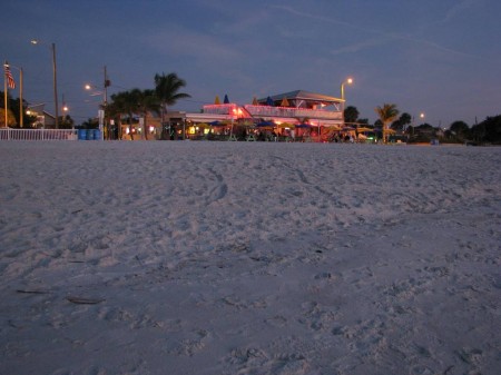IMG_6627 Caddy's On the Beach is a Sunset Beach Restaurant that sits right on the sand. Beer and fried stuff and fish sandwiches with an accompaniment of basic beach bar music. It's very popular.