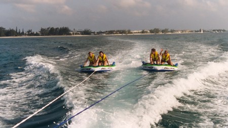 riding-towable-tubes Towable tubes - Grand Cayman. Speed is just right.