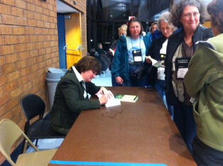 IMG_1202 Laura Erickson autographing copies of her book after her Keynote presentation, "Close Encounters of the Bird Kind."