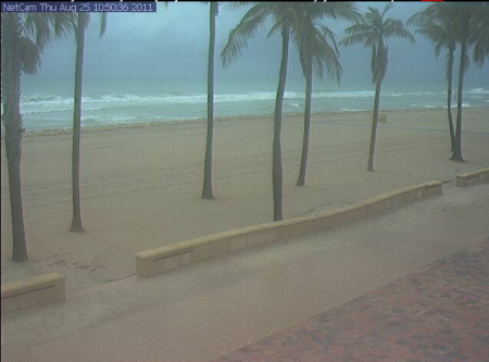 Rainy, windy weather and increasing surf from Hurricane Irene on Hollywood Beach, FL.