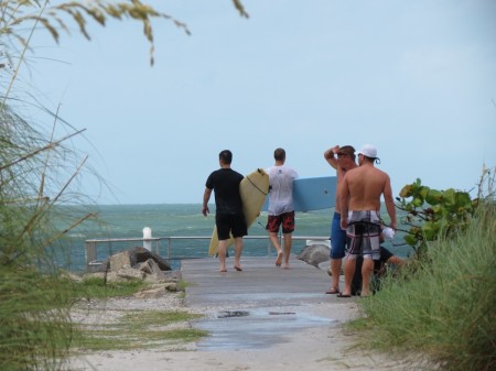 Surfing Pass-a-Grille Beach, Florida.