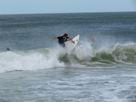 Surfing Pass-a-Grille Beach, Florida.