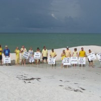 Suncoast Surfrider members demonstrate on Upham Beach.