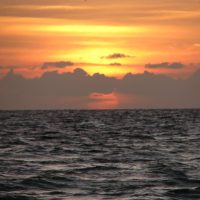 The sunset was slightly muted by a thick low cloud bank, but beautiful nonetheless. I'll take it.