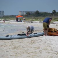Caladesi Island Takes You Back in Time You don't have to take the ferry to get to Caladesi Island. If you have your own boat, even a kayak, you can paddle to the island like these adventurers.