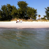 At Home in Holmes Beach, FL This panoramic image is centered at about 46th Street in Holmes Beach, FL. The process of putting the images together makes it look like the island curves toward me, but that is just an illusion.